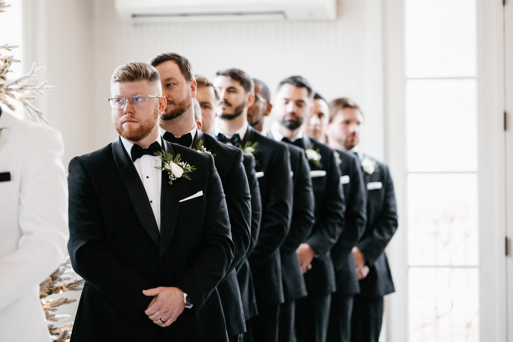 Groomsmen posed in formal attire
