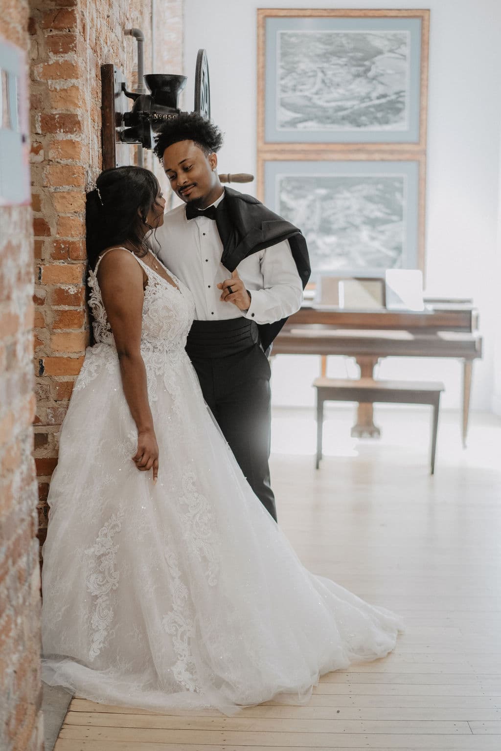 Couple at elegant brick-walled venue