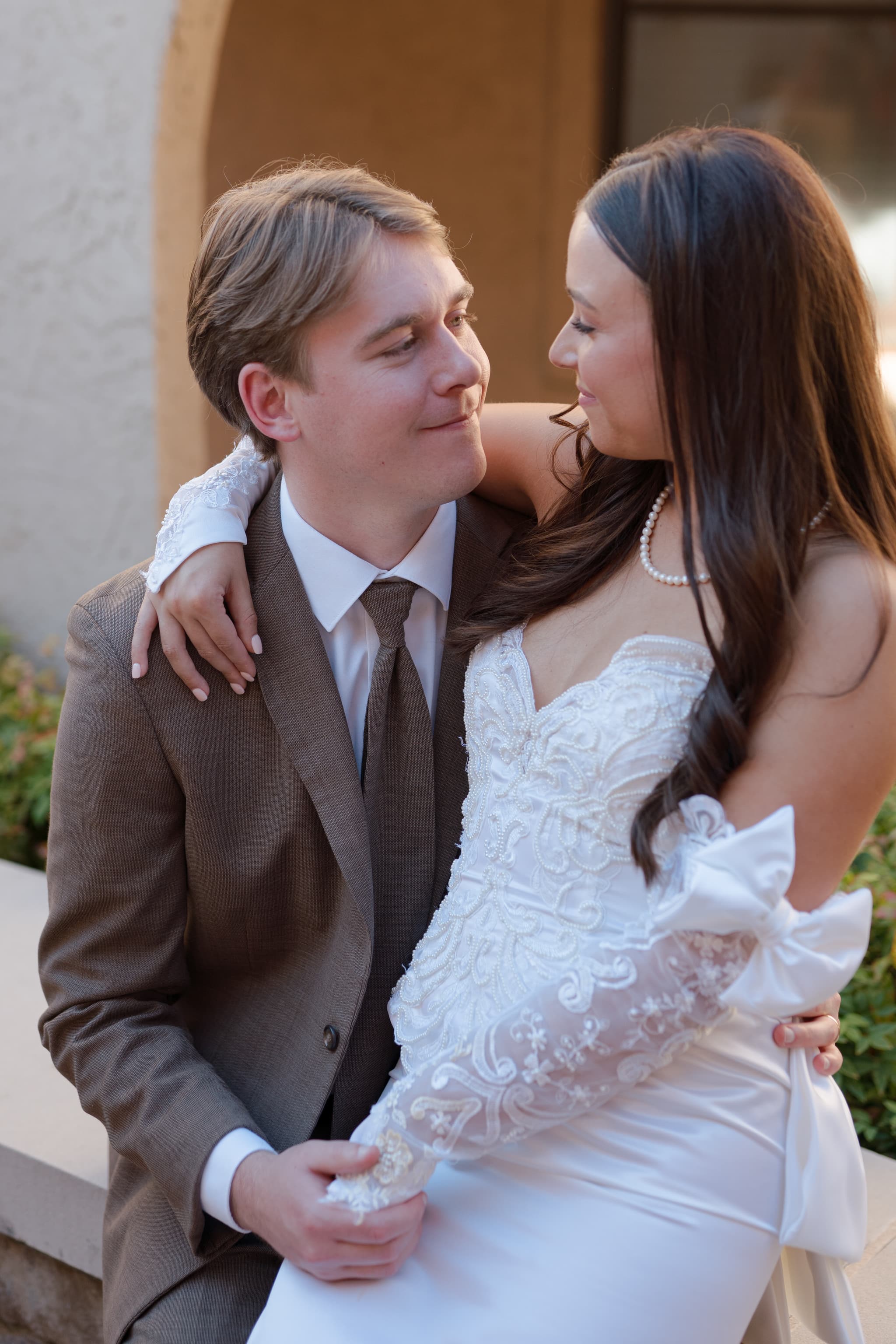 Couple sharing an intimate moment at their wedding