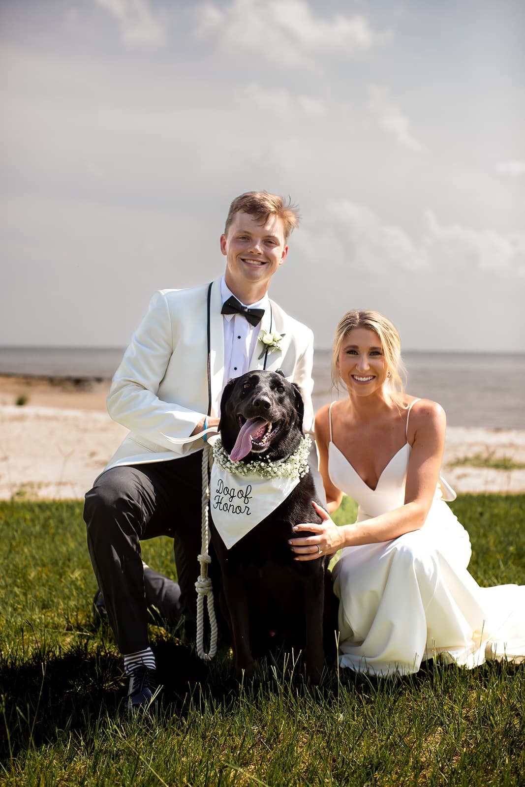 Garrett and Ellie with their dog Ozzy — the Get Tuxed family